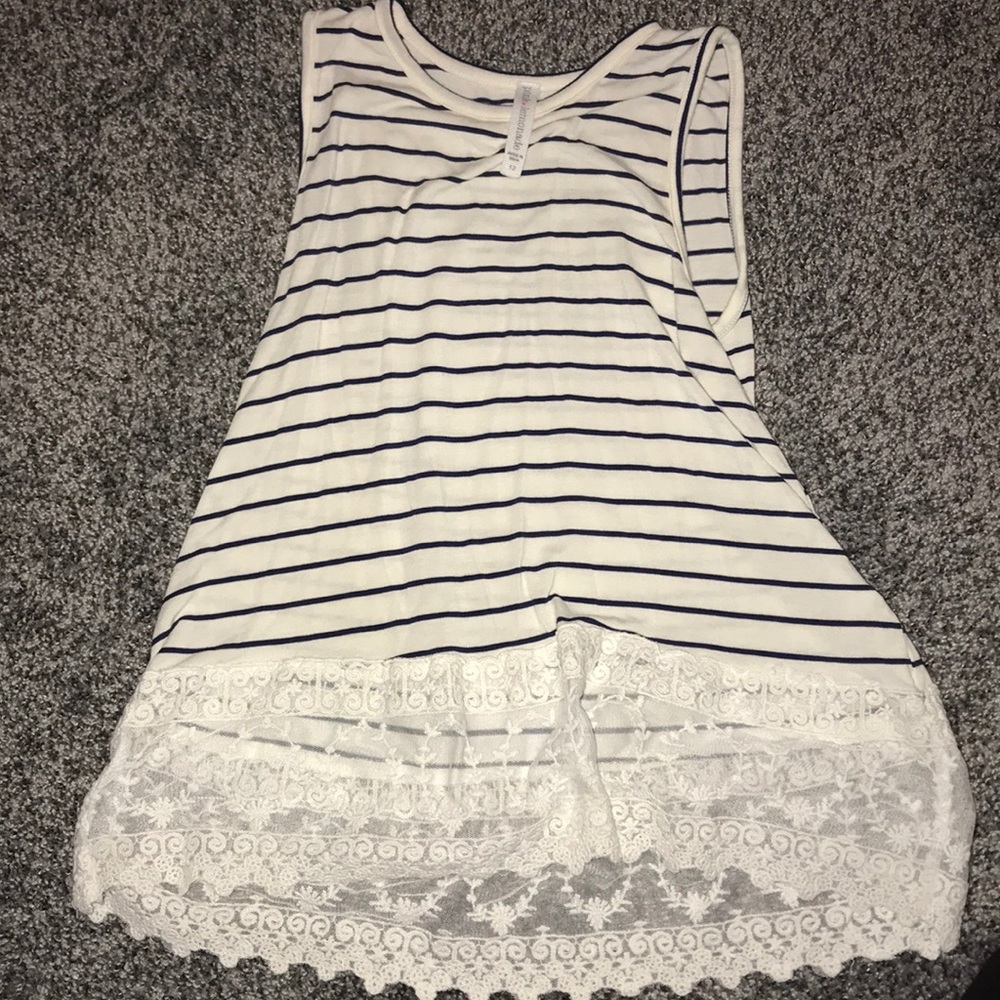 a navy blue and white striped tank top